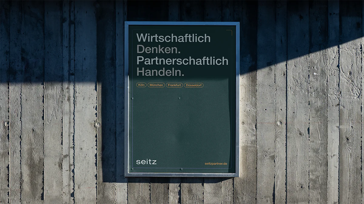 Seitz poster mockup in front of rustic wooden wall